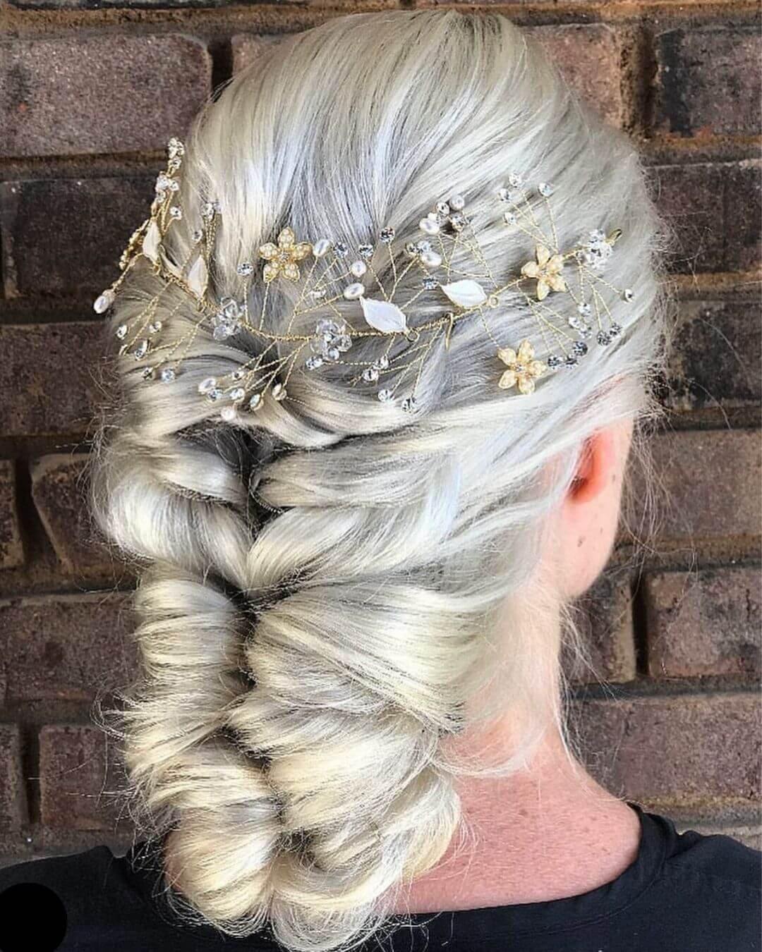 Christmas Inspired Hairstyles and Colors Blonde Braided Tucked Updo Glitter Florals