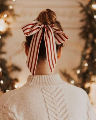 Christmas Inspired Hairstyles and Colors Bun Red Striped Ribbon Bow