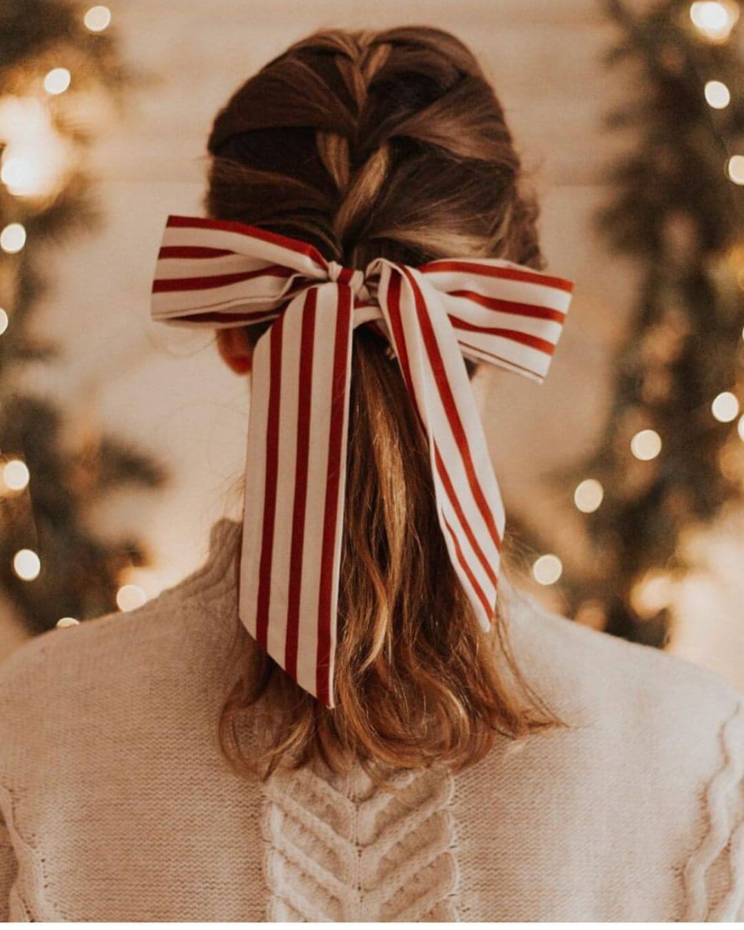 Christmas Inspired Hairstyles and Colors French Braid Red Striped Ribbon Bow