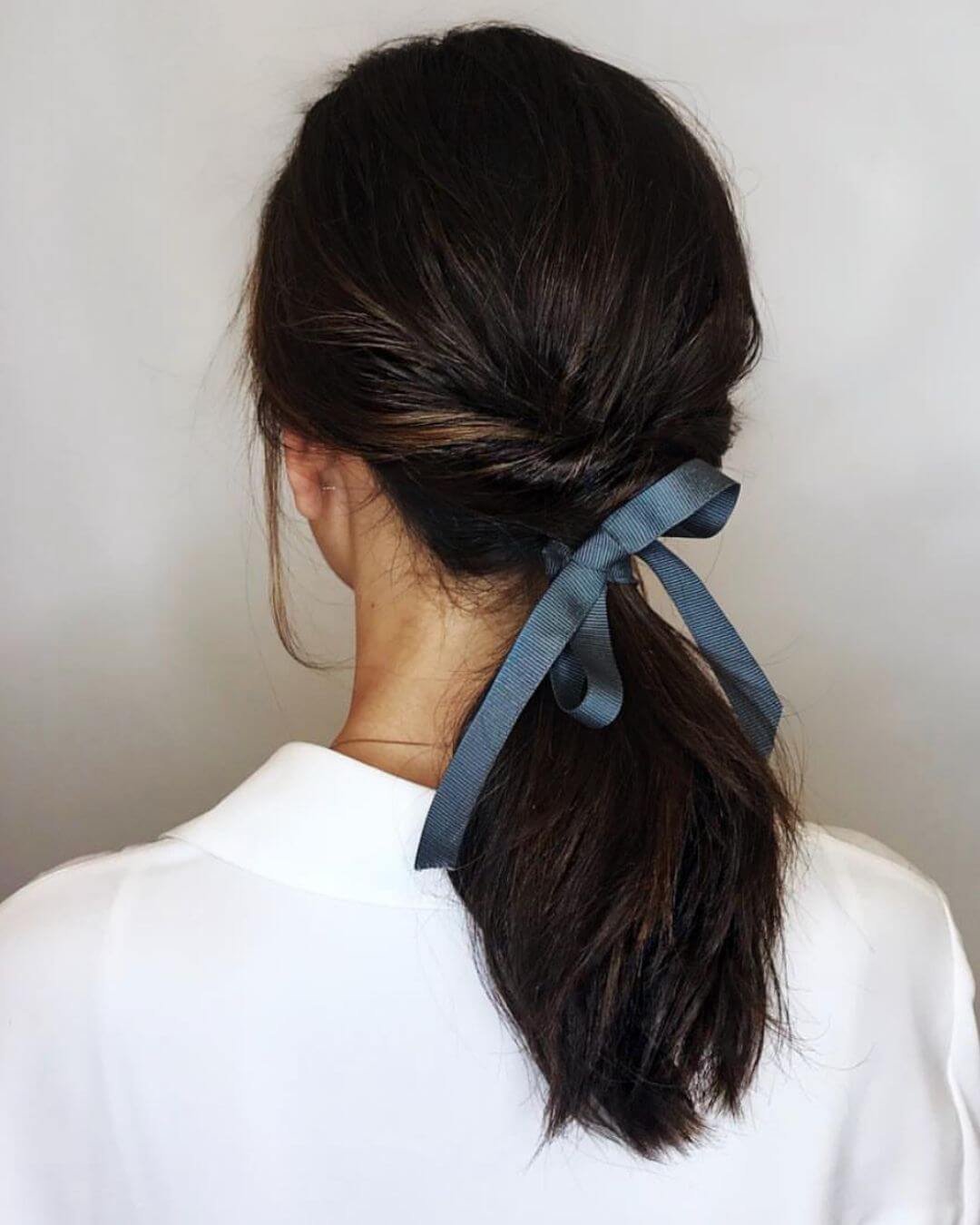 Christmas Inspired Hairstyles and Colors Half Twist Ponytail Blue Ribbon