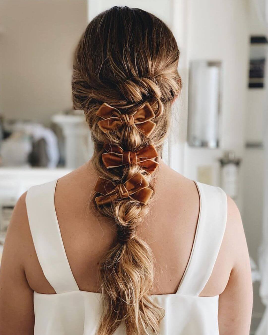 Christmas Inspired Hairstyles and Colors Triple Bows Long Braid