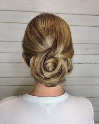 Christmas Inspired Hairstyles and Colors Twisted Low Bun